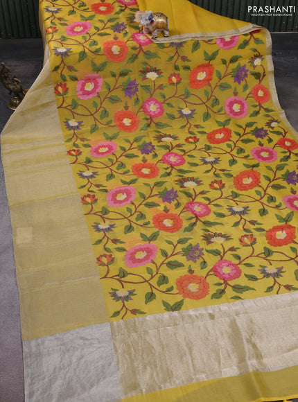 Organza silk saree yellow with allover floral embroidery work and long zari woven border