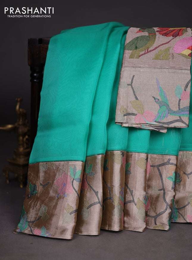Organza silk saree teal green with plain body and embroidery border