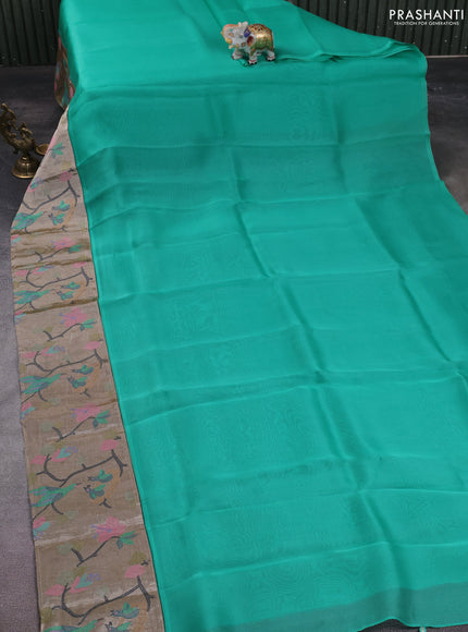 Organza silk saree teal green with plain body and embroidery border