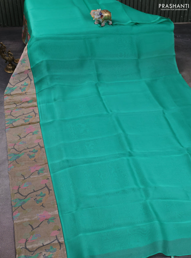 Organza silk saree teal green with plain body and embroidery border