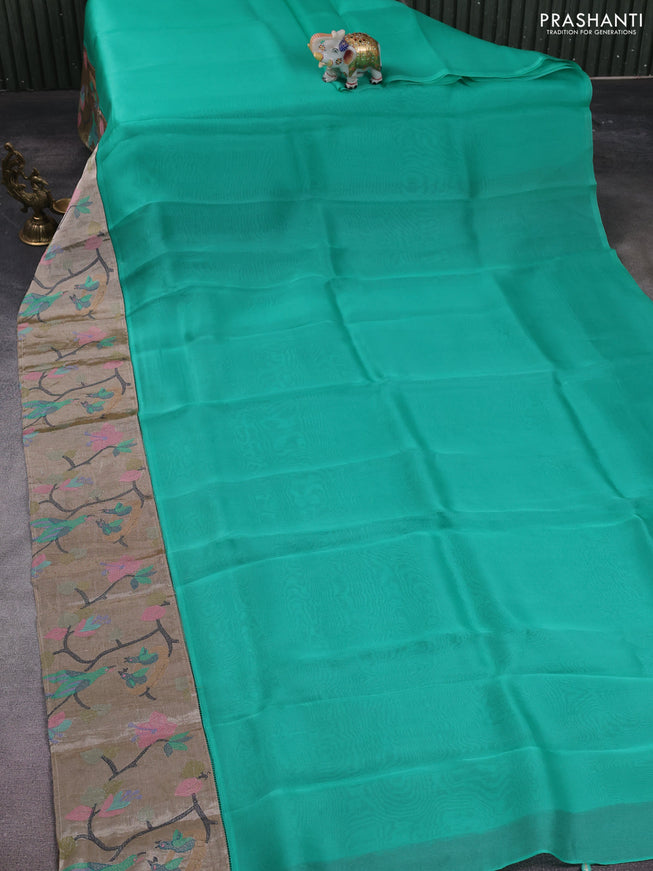 Organza silk saree teal green with plain body and embroidery border