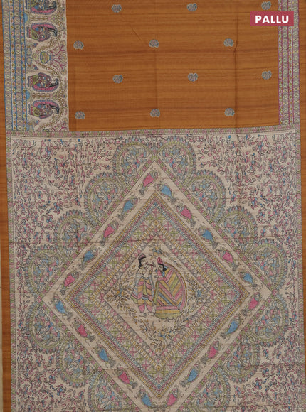 Semi tussar saree dark mustard and cream with paisley butta prints and madhubani printed pallu & border
