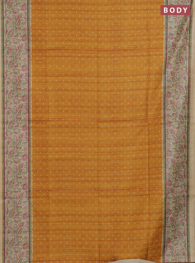 Semi tussar saree mustard yellow and cream with allover bandhani prints and madhubani printed pallu & border