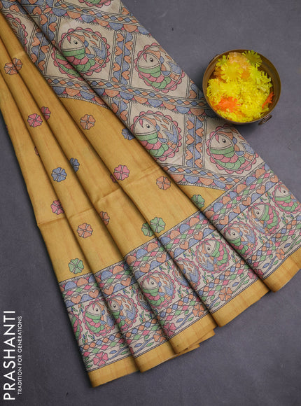 Semi tussar saree mustard yellow and beige with allover butta prints and madhubani printed pallu & border