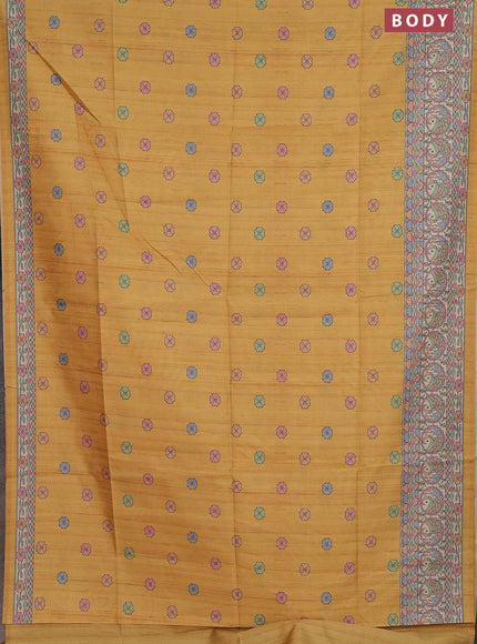 Semi tussar saree mustard yellow and beige with allover butta prints and madhubani printed pallu & border