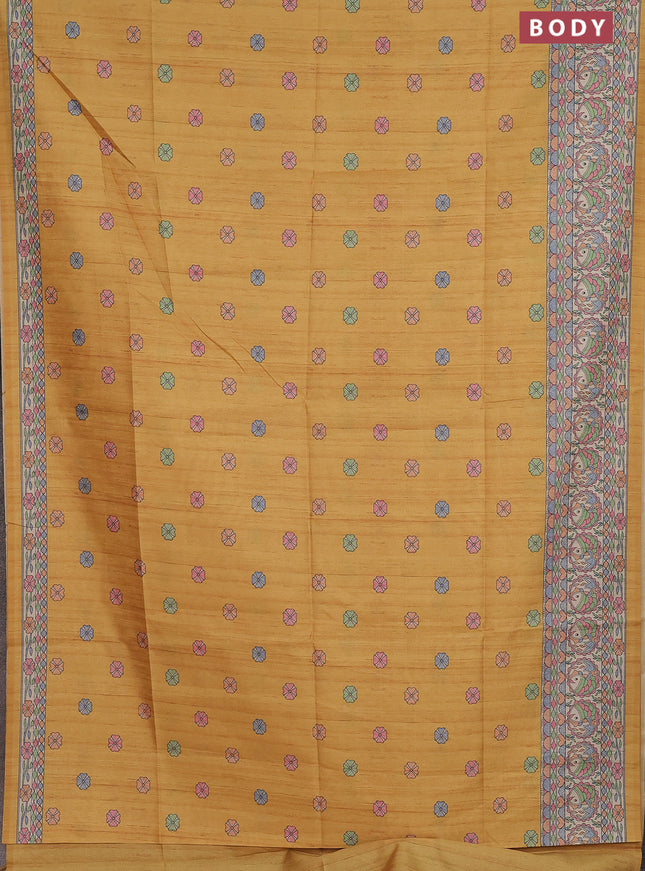 Semi tussar saree mustard yellow and beige with allover butta prints and madhubani printed pallu & border