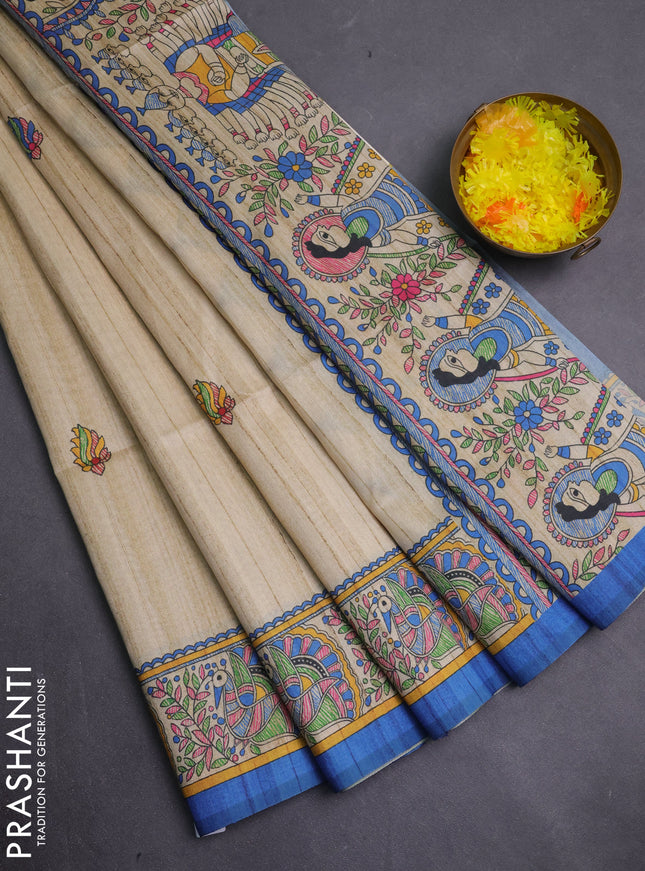 Semi tussar saree blue and cream with allover butta prints and madhubani printed pallu & border