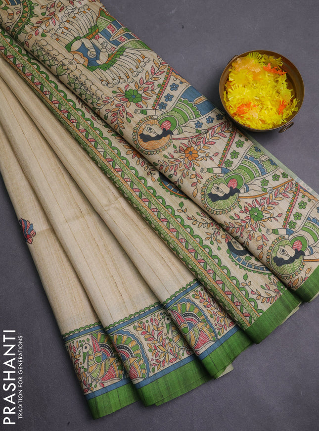 Semi tussar saree light green and cream with allover butta prints and madhubani printed pallu & border