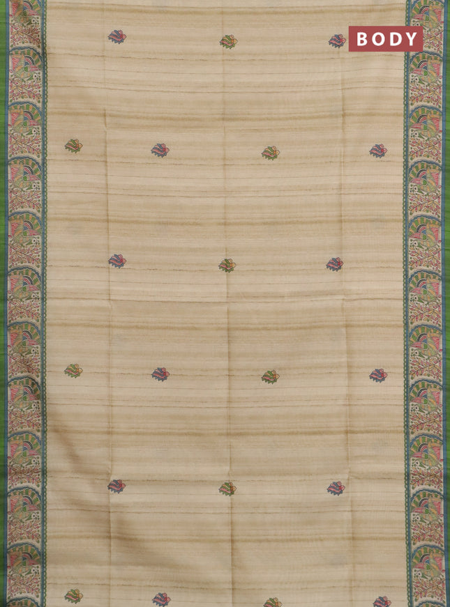 Semi tussar saree light green and cream with allover butta prints and madhubani printed pallu & border