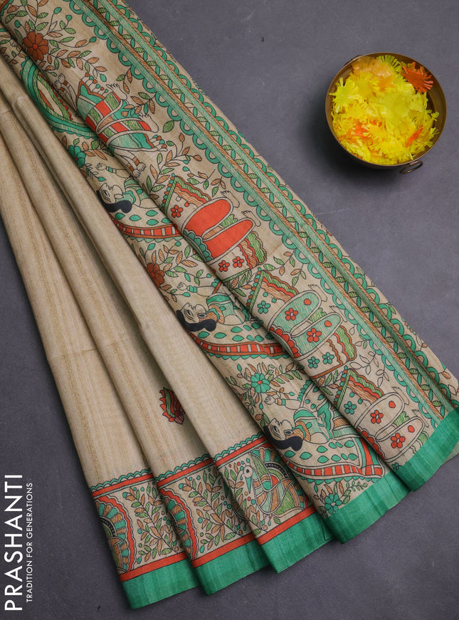 Semi tussar saree green and cream with allover butta prints and madhubani printed pallu & border