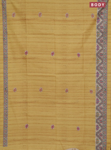 Semi tussar saree mustard yellow and cream with butta prints and madhubani printed pallu & border