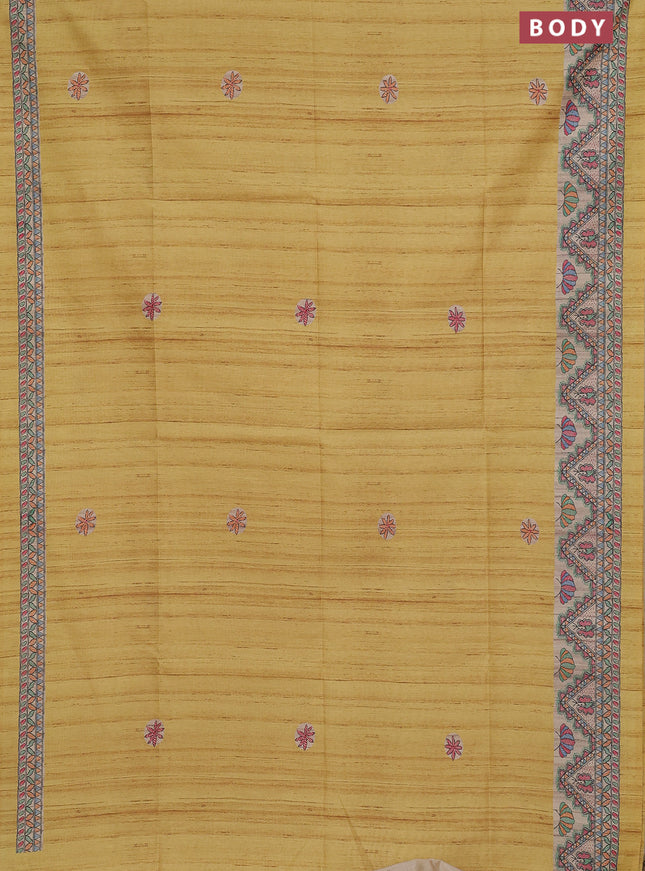 Semi tussar saree mustard yellow and cream with butta prints and madhubani printed pallu & border