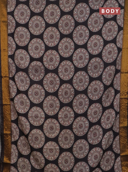 Kalamkari semi silk saree black with allover prints and mangalgiri border