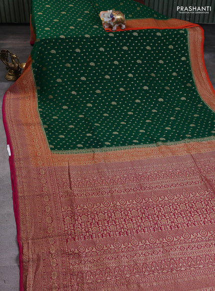Banarasi georgette saree green and orange pink with allover thread & zari woven buttas and woven border