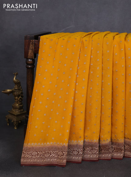 Banarasi georgette saree mustard yellow and brown with allover thread & zari woven buttas and woven border