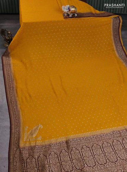 Banarasi georgette saree mustard yellow and brown with allover thread & zari woven buttas and woven border