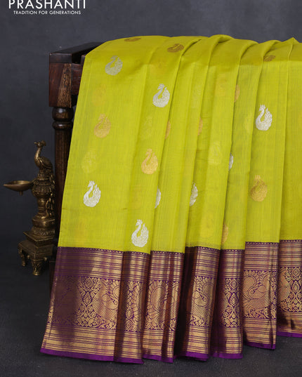 Kora kanchipuram silk saree lime yellow and purple with silver & gold zari woven buttas and annam zari woven border