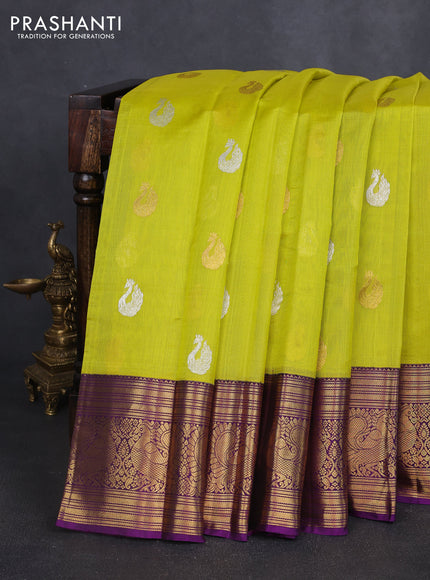 Kora kanchipuram silk saree lime yellow and purple with silver & gold zari woven buttas and annam zari woven border