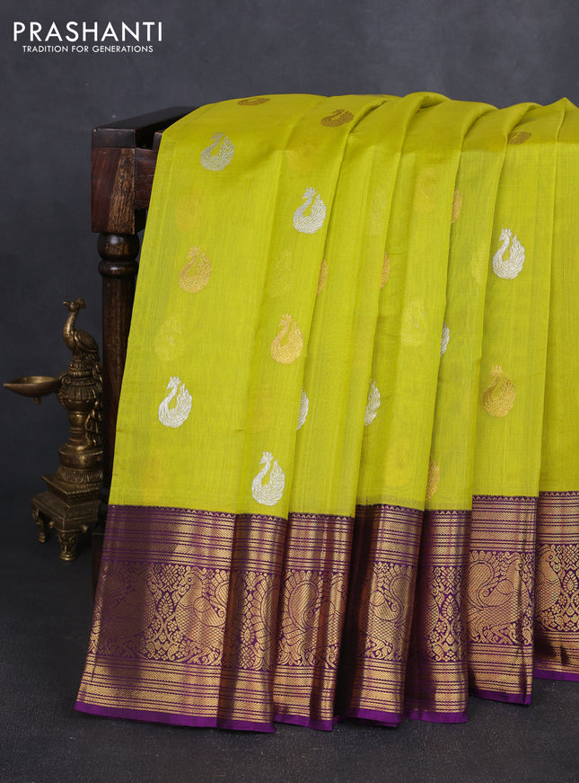 Kora kanchipuram silk saree lime yellow and purple with silver & gold zari woven buttas and annam zari woven border