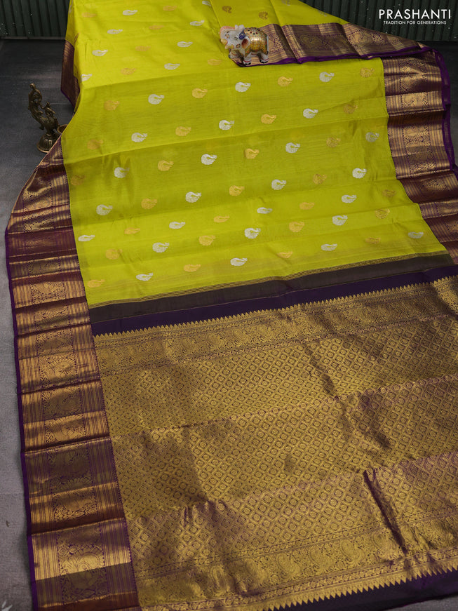 Kora kanchipuram silk saree lime yellow and purple with silver & gold zari woven buttas and annam zari woven border