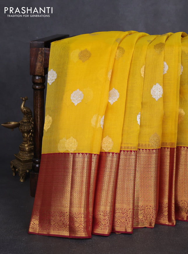 Kora kanchipuram silk saree yellow and maroon with silver & gold zari woven buttas and long zari woven korvai border