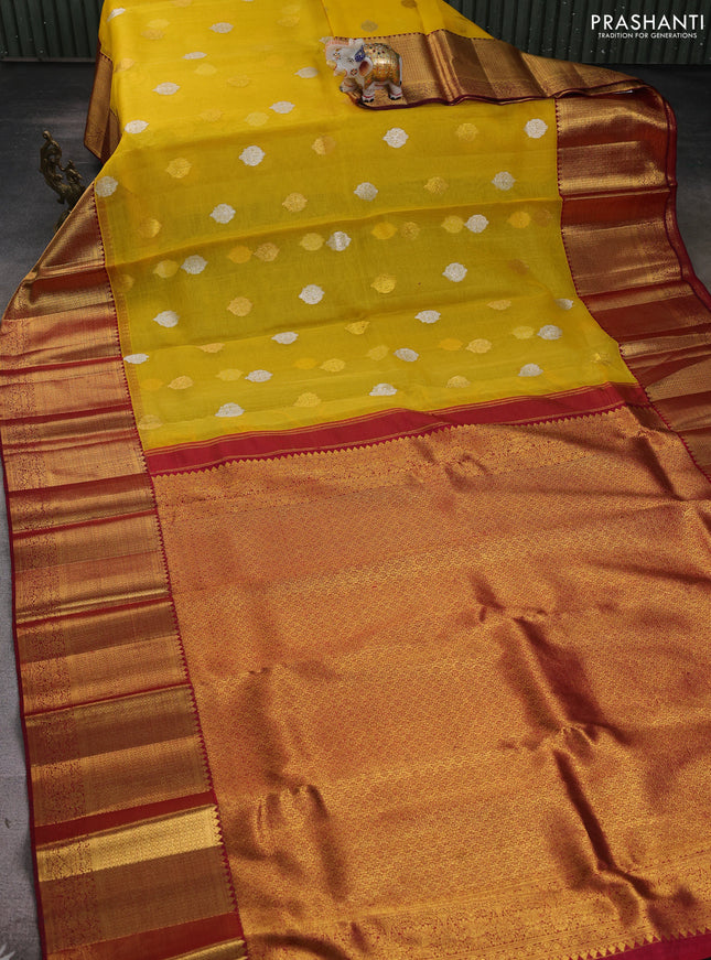 Kora kanchipuram silk saree yellow and maroon with silver & gold zari woven buttas and long zari woven korvai border