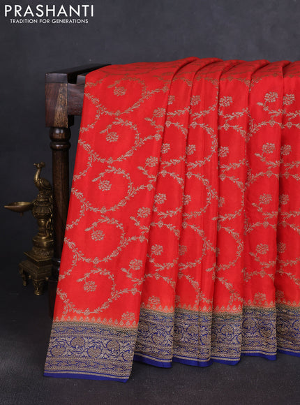 Banarasi crepe saree orange and dark blue with allover thread & zari weaves and woven border