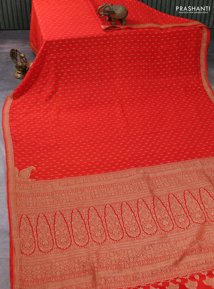 Banarasi crepe saree orange with allover thread & zari geometric weaves and woven border