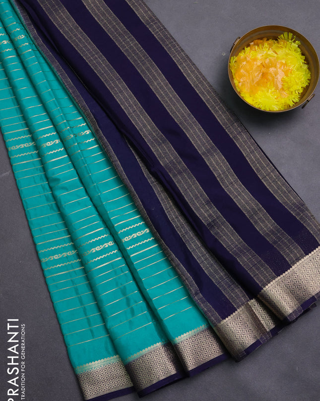 Semi mysore silk saree teal green and navy blue with allover zari weaves and zari woven border