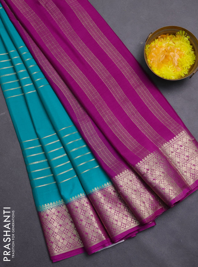 Semi mysore silk saree teal green and pink with allover zari weaves and zari woven border