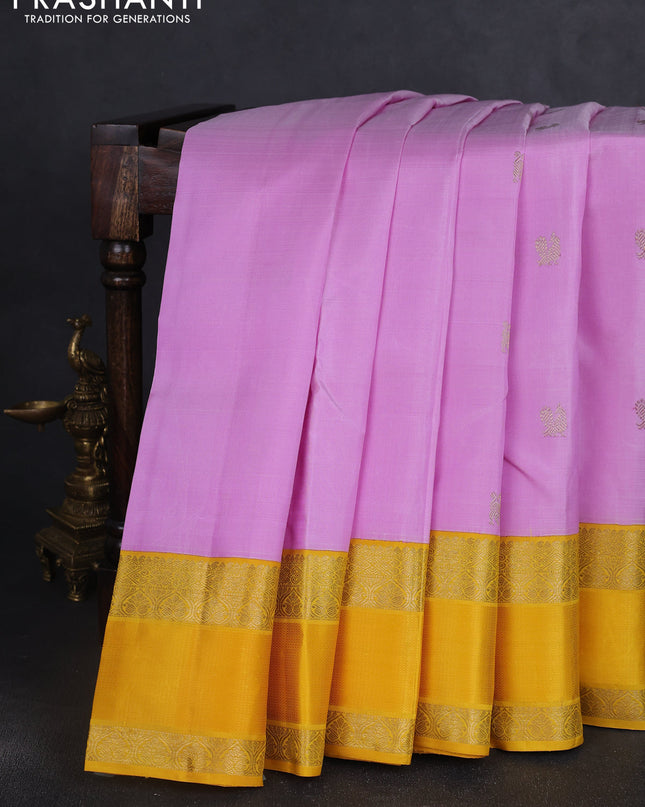 Pure kanchipuram silk saree mild lavender and yellow with zari woven buttas and rich zari woven korvai border