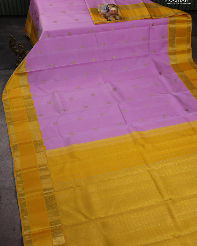 Pure kanchipuram silk saree mild lavender and yellow with zari woven buttas and rich zari woven korvai border