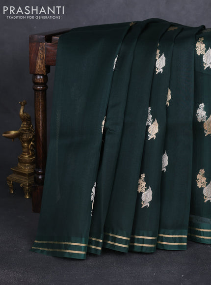 Banarasi organza silk saree bottle green with allover zari woven buttas and zari woven border