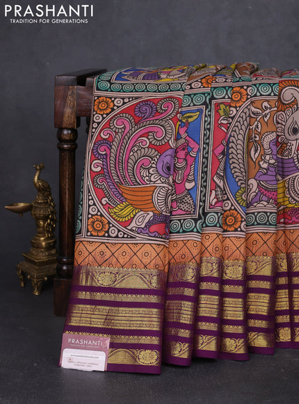 Pure kanchipuram silk saree peach orange and purple with allover penkalamkari prints and rich zari woven border