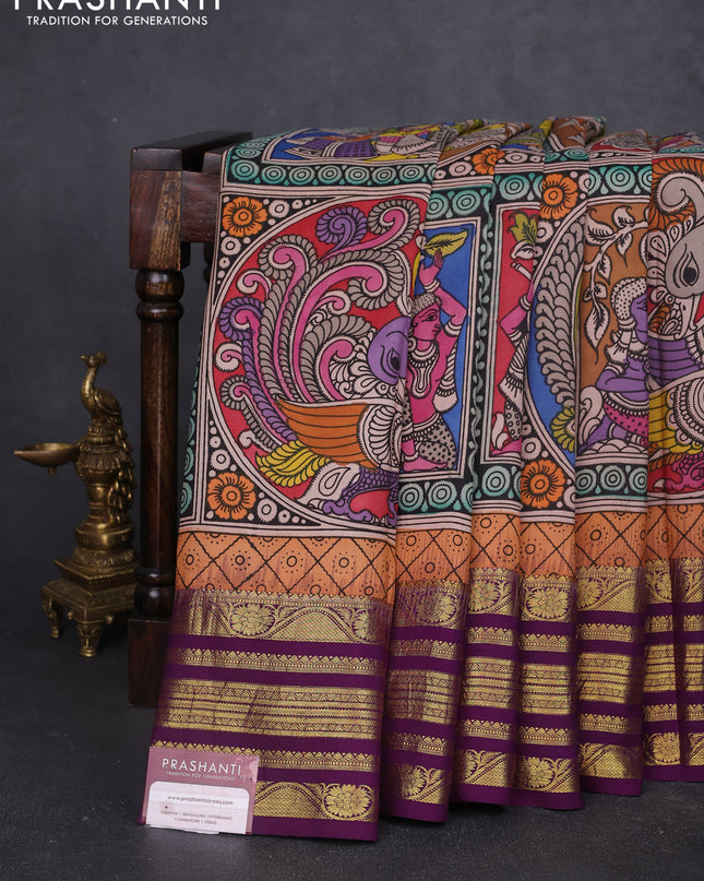 Pure kanchipuram silk saree peach orange and purple with allover penkalamkari prints and rich zari woven border