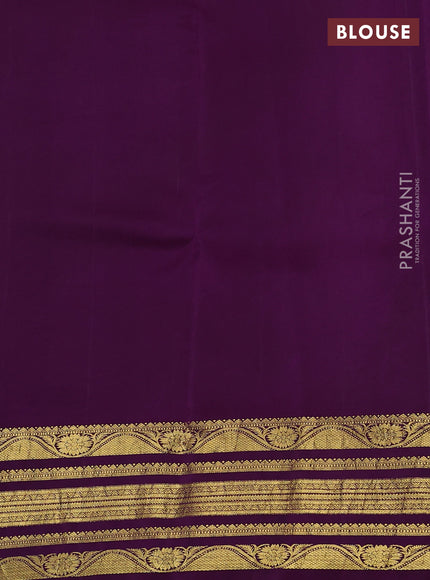 Pure kanchipuram silk saree peach orange and purple with allover penkalamkari prints and rich zari woven border