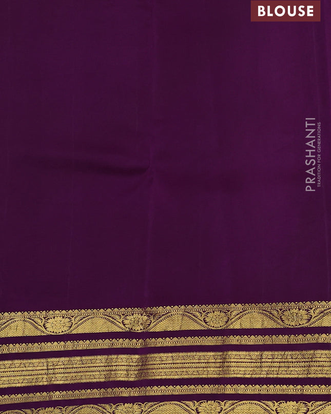 Pure kanchipuram silk saree peach orange and purple with allover penkalamkari prints and rich zari woven border
