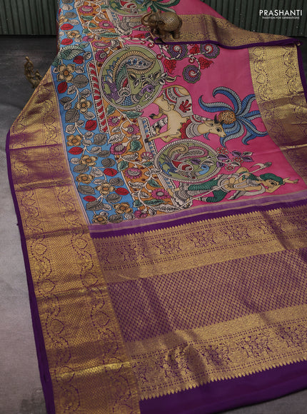 Pure kanchipuram silk saree peach pink and purple with allover penkalamkari prints and long rich zari woven border