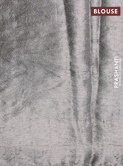 Pure organza silk saree black with allover silver zari weaves and floral embroidery border