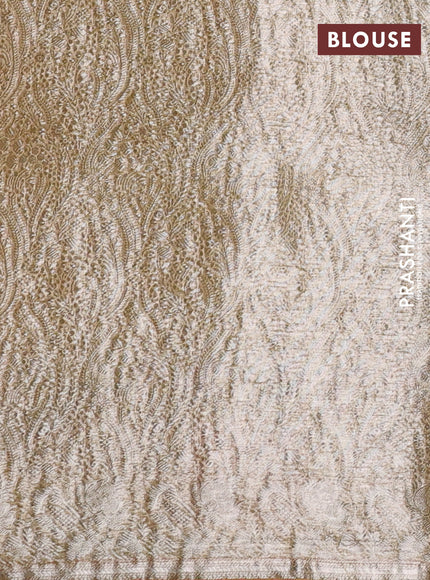 Pure organza silk saree yellow and peach shade with allover silver zari weaves and floral embroidery border