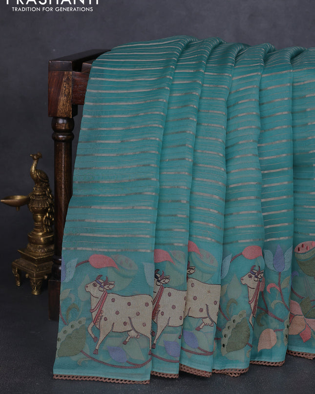 Pure organza silk saree teal green with allover silver zari weaves and pichwai embroidery border