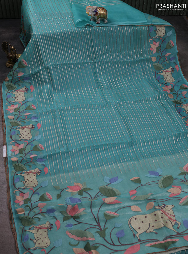 Pure organza silk saree teal green with allover silver zari weaves and pichwai embroidery border