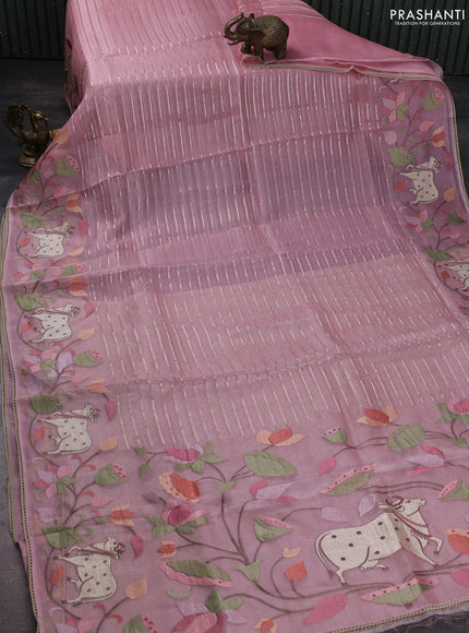 Pure organza silk saree peach shade with allover silver zari weaves and pichwai embroidery border