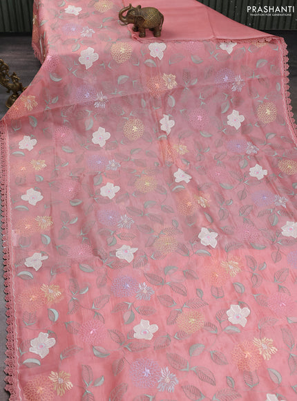 Pure organza silk saree peach shade with floral embroidery work and lace work border