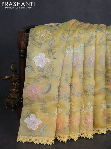 Pure organza silk saree pale yellow with allover applique work and lace work border
