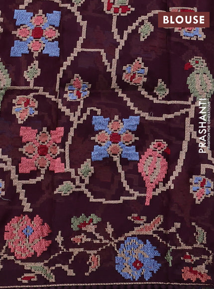 Pure organza silk saree purple and wine shade with plain body and floral embroidery border