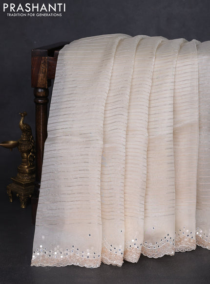 Pure organza silk saree off white with allover zari weaves and sequin mirror work border