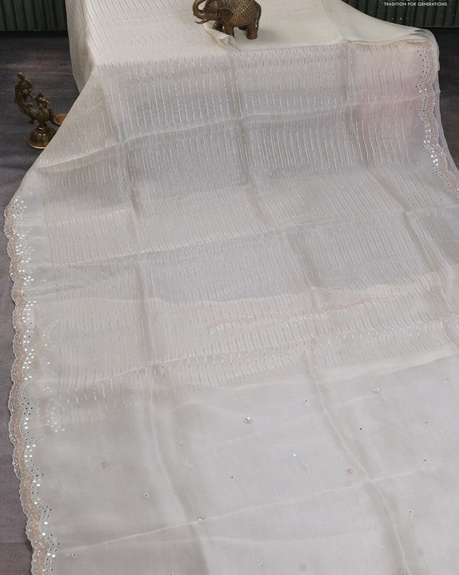 Pure organza silk saree off white with allover zari weaves and sequin mirror work border