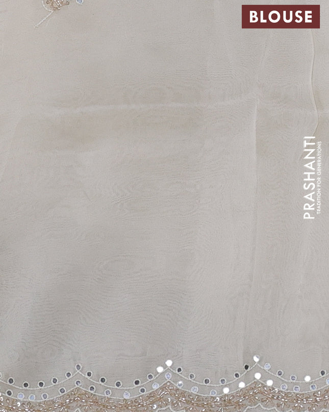 Pure organza silk saree off white with allover zari weaves and sequin mirror work border