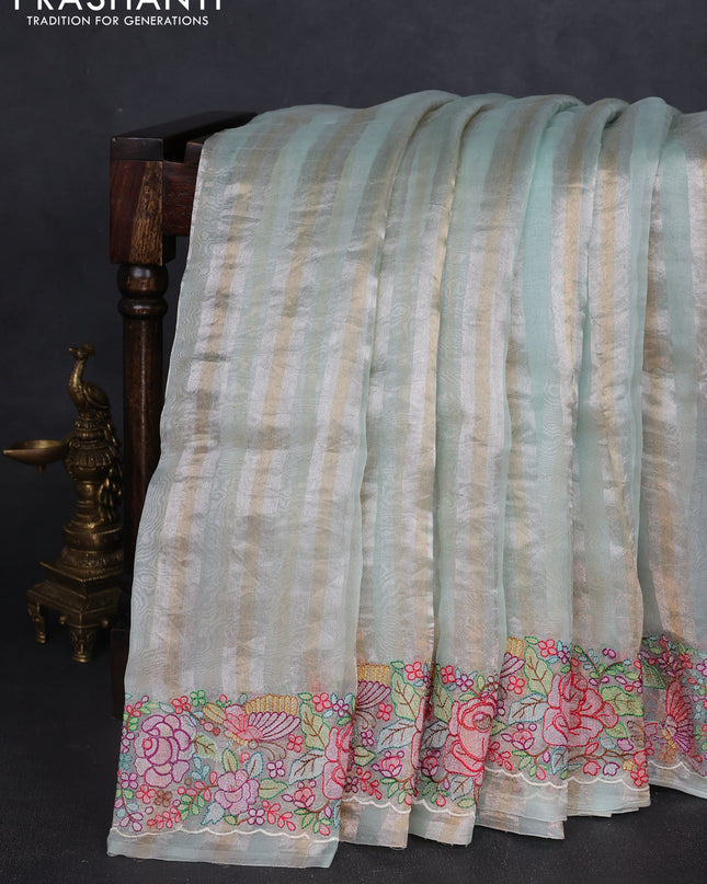 Pure organza silk saree pastel green with allover silver & zari stripes pattern and floral embroidery border